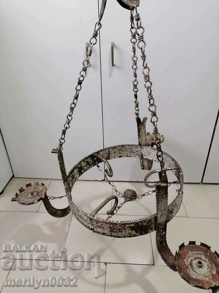 Old wrought iron engraved chandelier lamp without lampshade