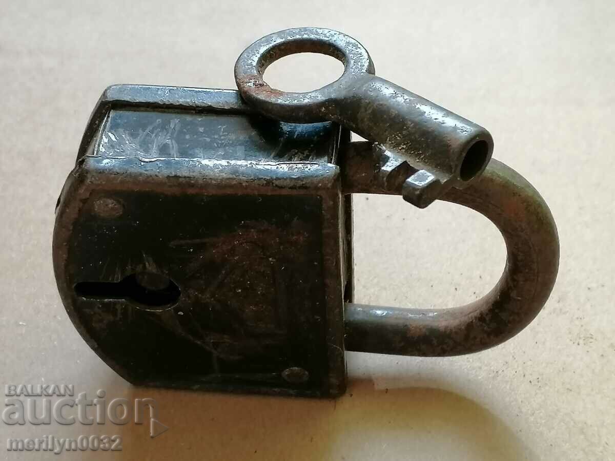 Auction  Old padlock with key, suitcase, padlock, latch, lock