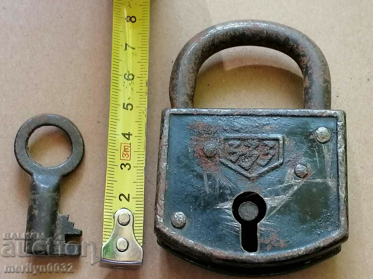 Delivery of Old padlock with key, suitcase, padlock, latch, lock