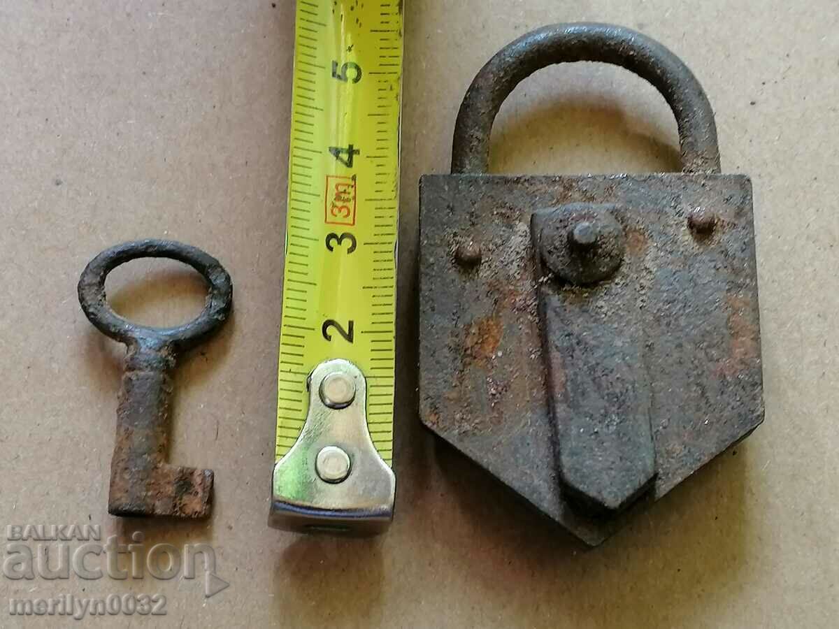 Auction  Old padlock with key, suitcase, padlock, latch, lock