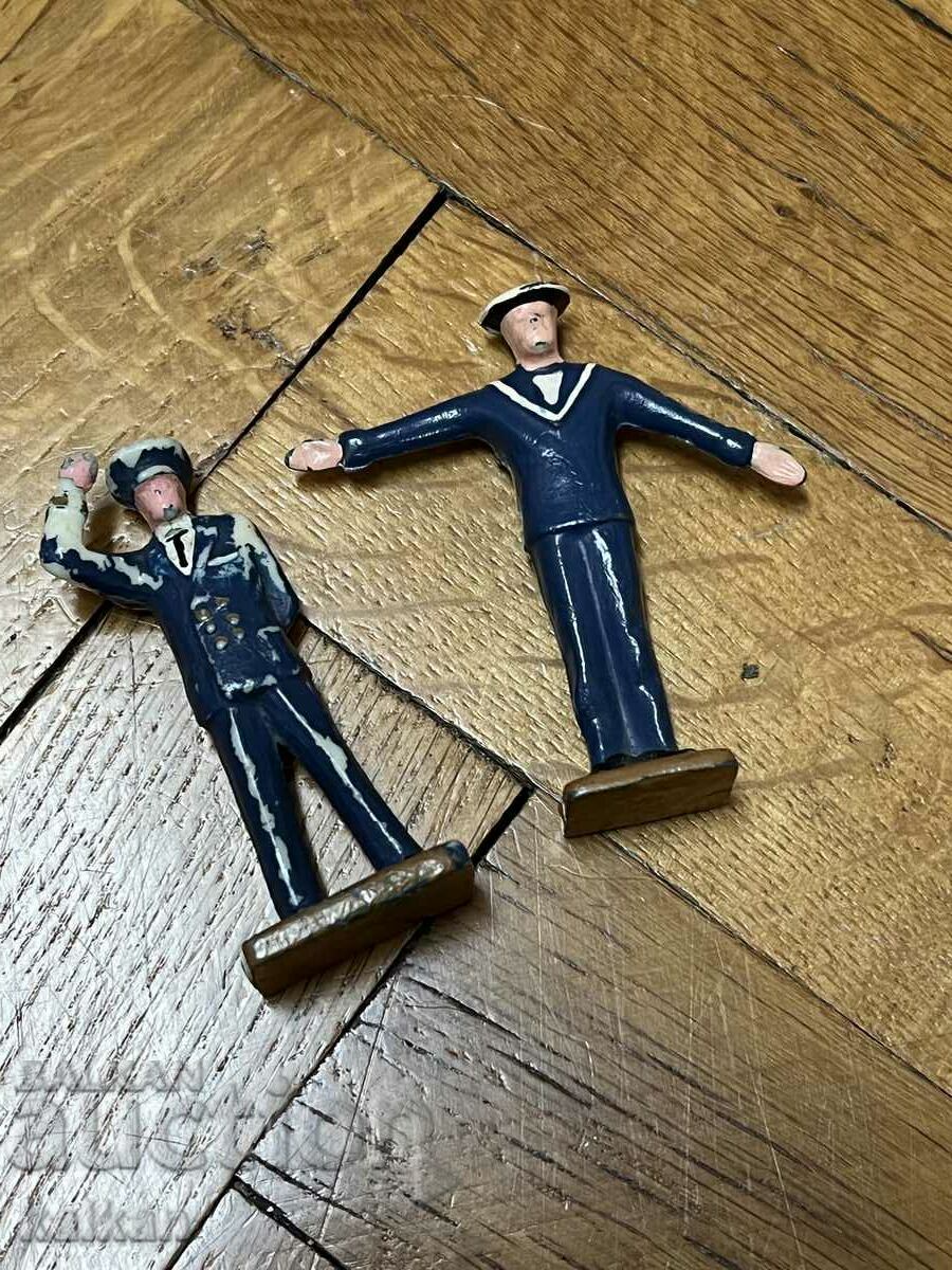 Toys - two figurines of a captain and a sailor