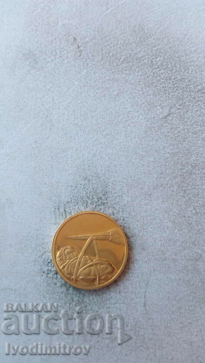 Gold-plated part. Wes Christmas Happy New Year Stork and baby with price 6.85 BGN | € 3.50 Gold-plated part. Wes Christmas Happy New Year Stork and baby with price 6.85 BGN | € 3.50