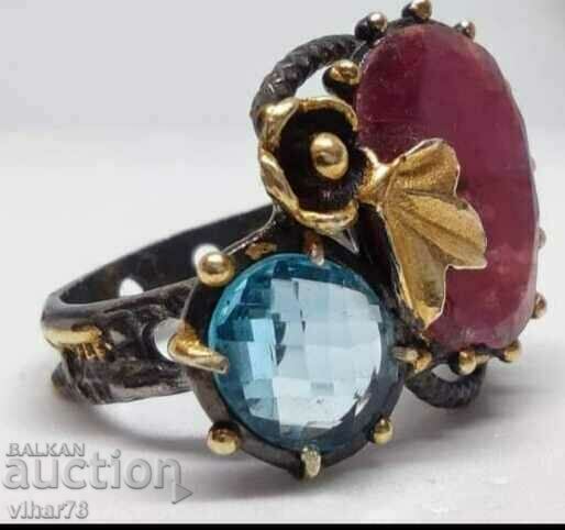 Silver ring with ruby and topaz with price 299.99 BGN | € 153.38 Silver ring with ruby and topaz with price 299.99 BGN | € 153.38