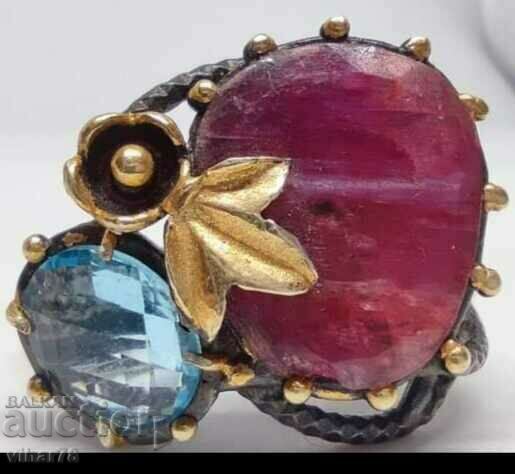 Silver ring with ruby and topaz