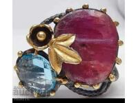 Silver ring with ruby and topaz