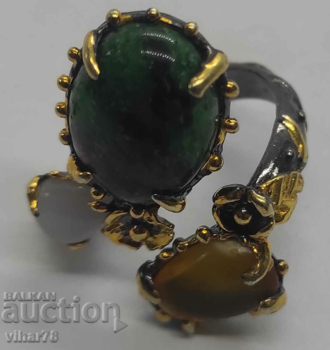 Delivery of Silver ring with ruby in ziosite, amber and quartz Delivery of Silver ring with ruby in ziosite, amber and quartz