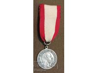 I am selling some old English medal.