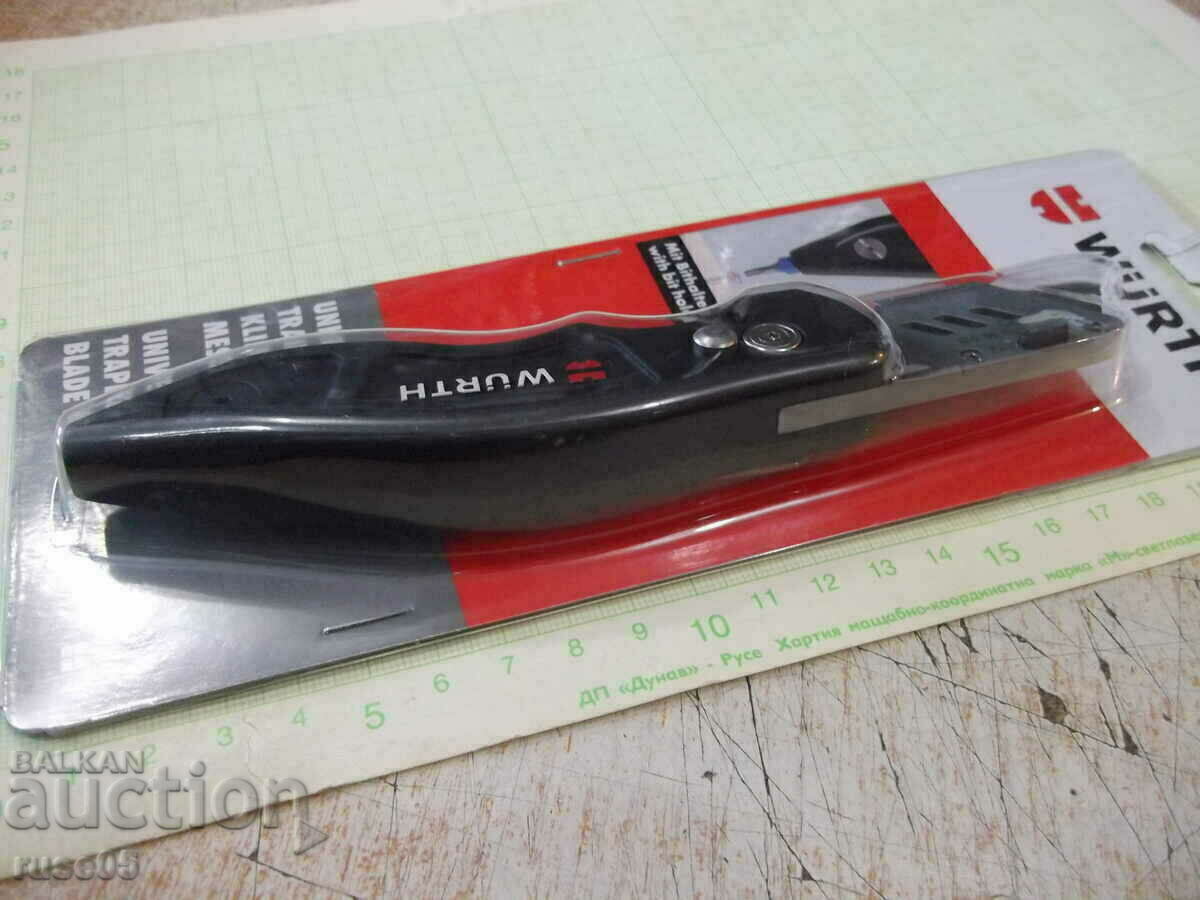 Auction "WÜRTH" model knife with trapezoidal blade and bit holder Auction "WÜRTH" model knife with trapezoidal blade and bit holder