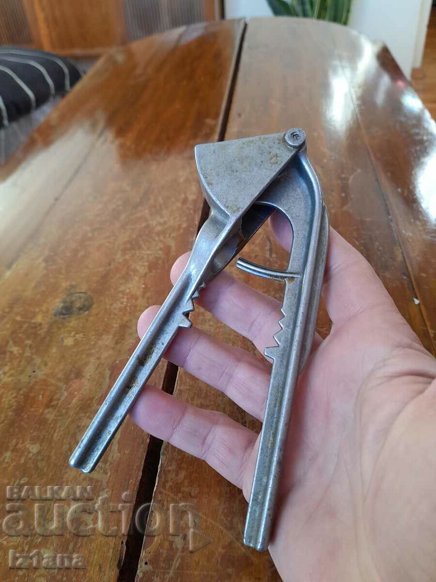 Old aluminum garlic press with price 15.00 BGN | € 7.67