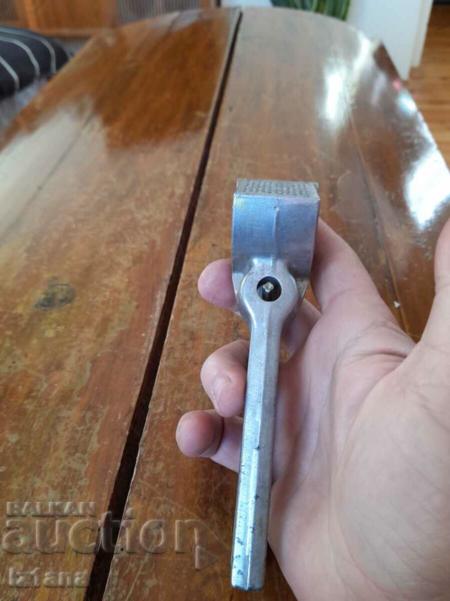 Auction  Old aluminum garlic press