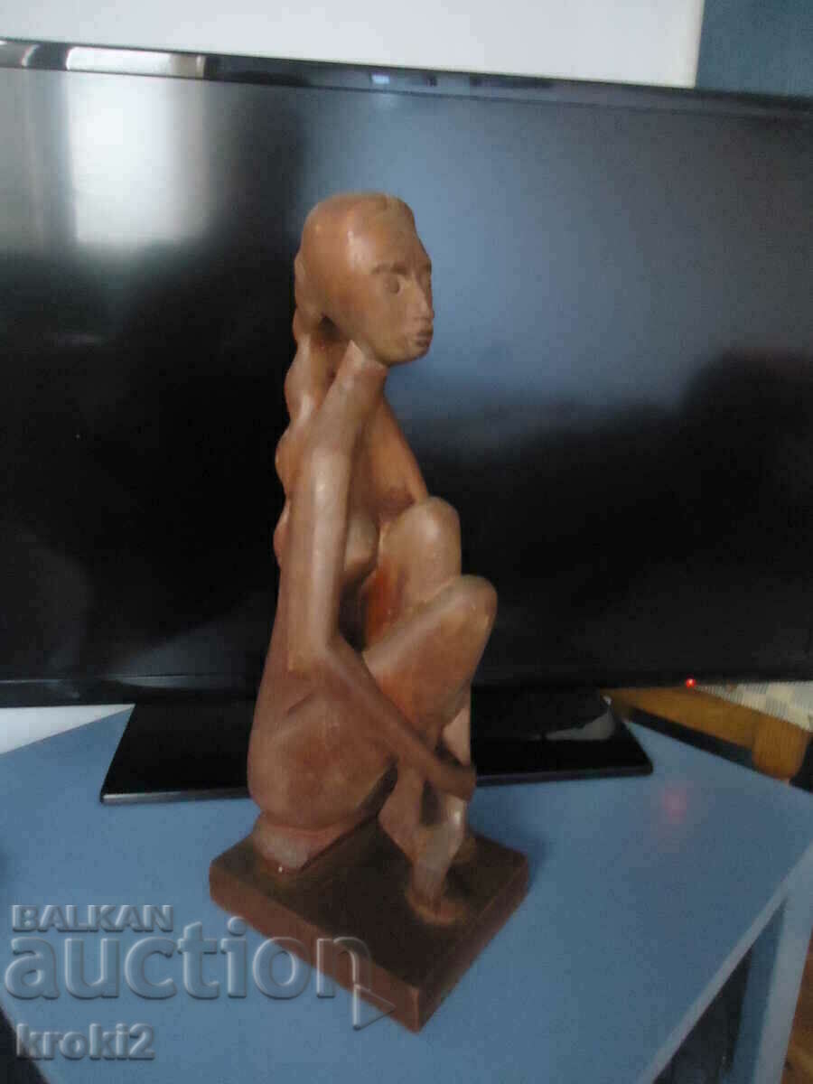 Old wooden figure statuette wood carving abstract erotica