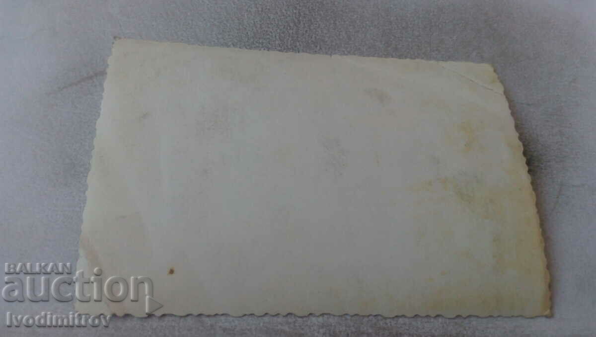 Photo Men and women in front of a vintage bus with price 1.65 BGN | € 0.84 Photo Men and women in front of a vintage bus with price 1.65 BGN | € 0.84