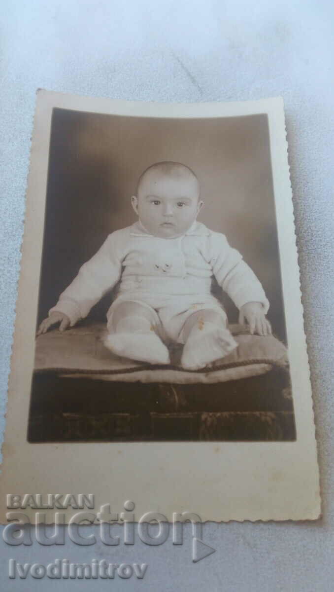 Photo Baby in a chair