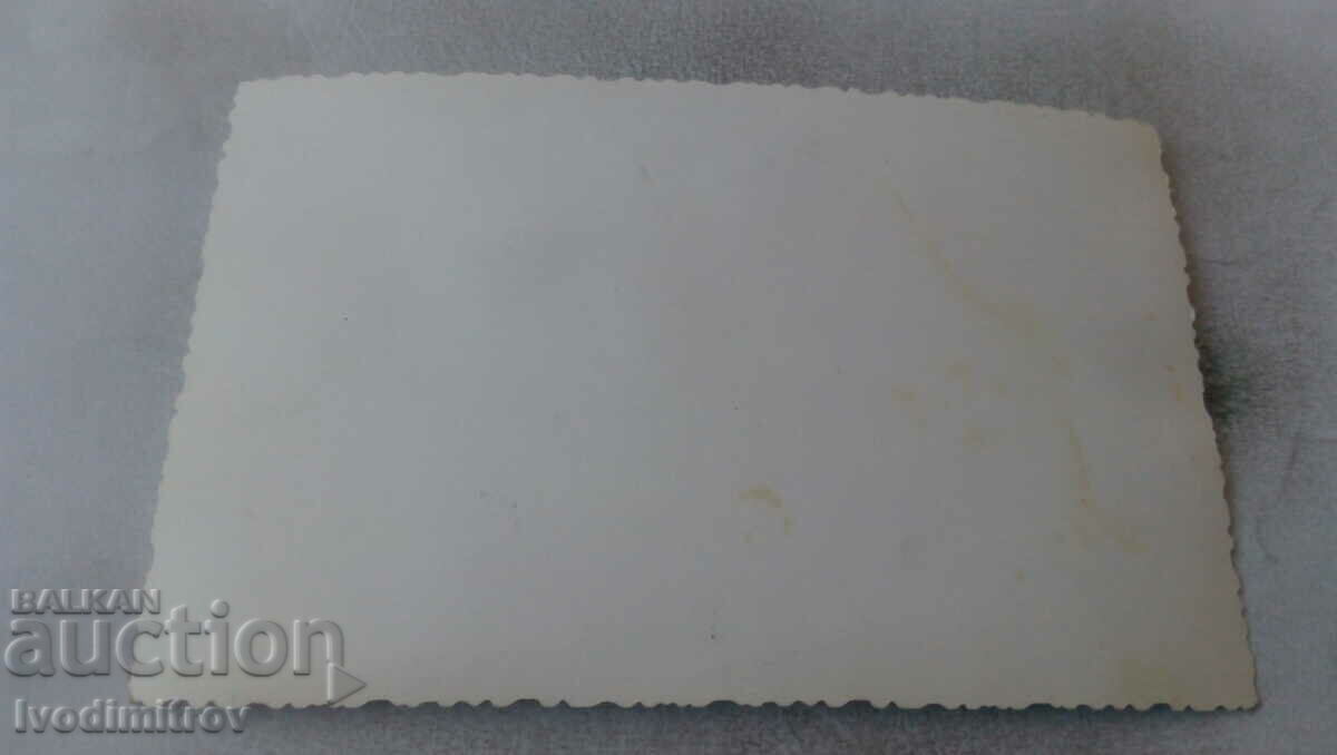 Photo of newlyweds with their friends with price 1.35 BGN | € 0.69