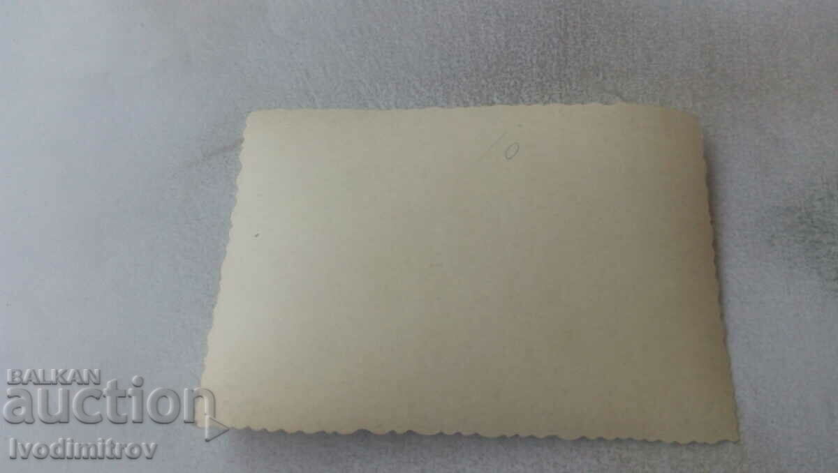 Photo Men, women and a dog on an excursion with price 0.85 BGN | € 0.43