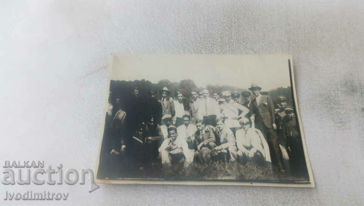 Photo Officers and youths on the meadow