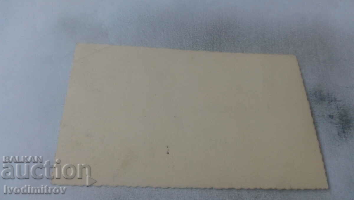 Photo Young woman in traditional costume with price 2.35 BGN | € 1.20 Photo Young woman in traditional costume with price 2.35 BGN | € 1.20