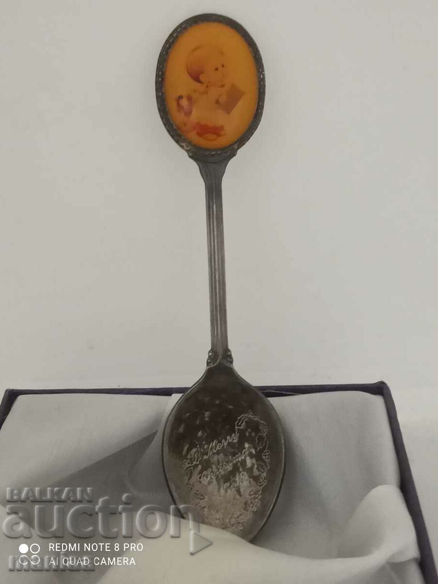 Souvenir spoon with porcelain