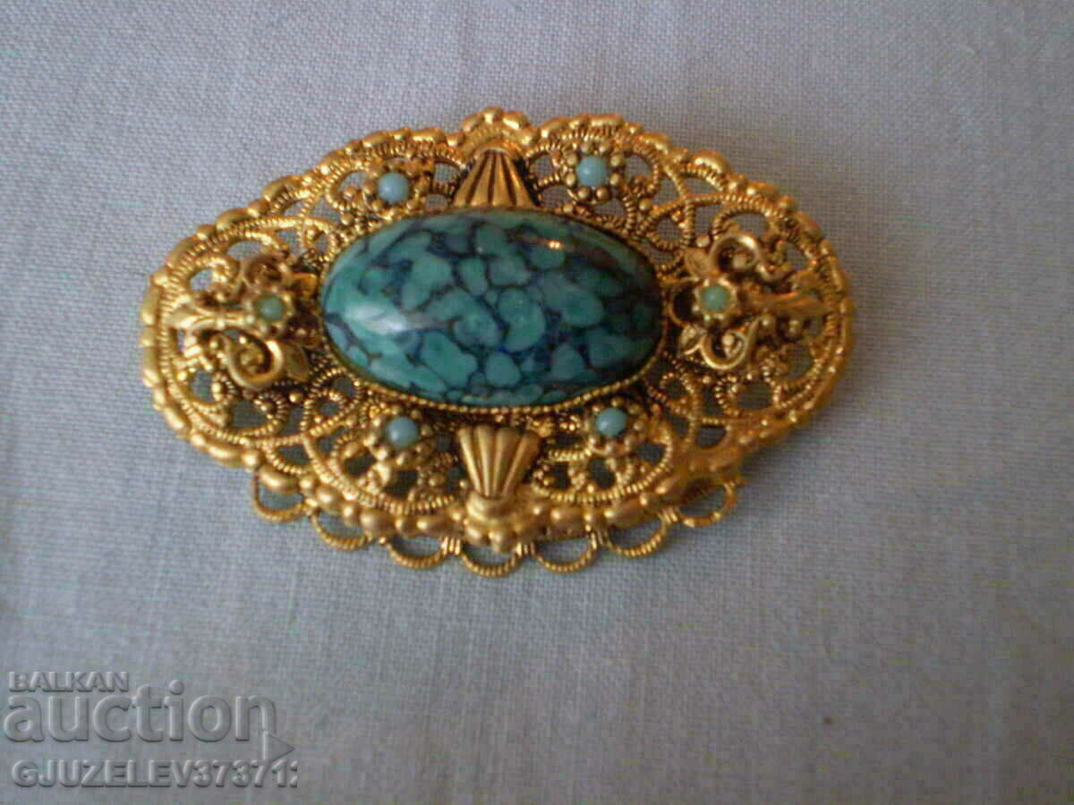 Vintage filigree yellow metal brooch