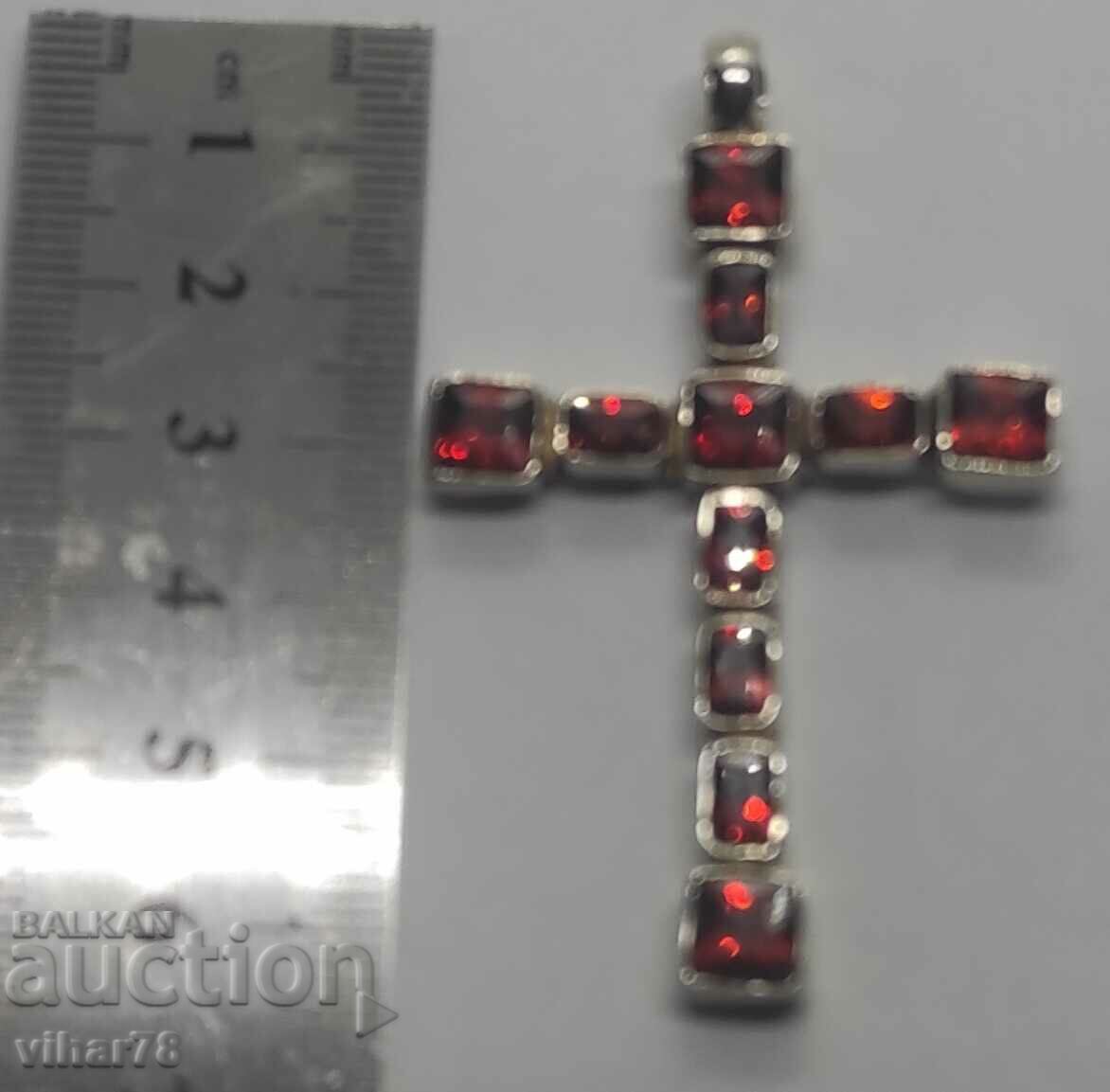 A large silver cross studded with garnets with price 249.99 BGN | € 127.82