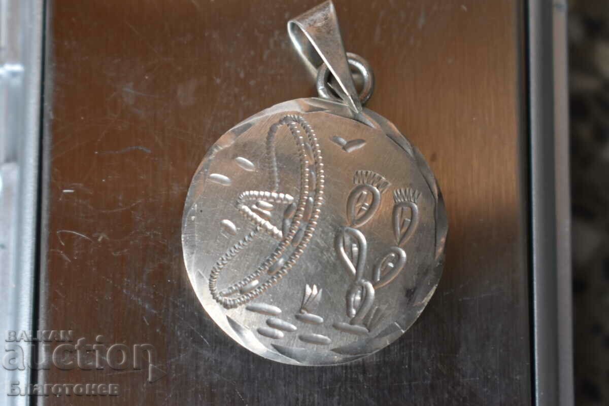 Auction  Silver jewelry pendant