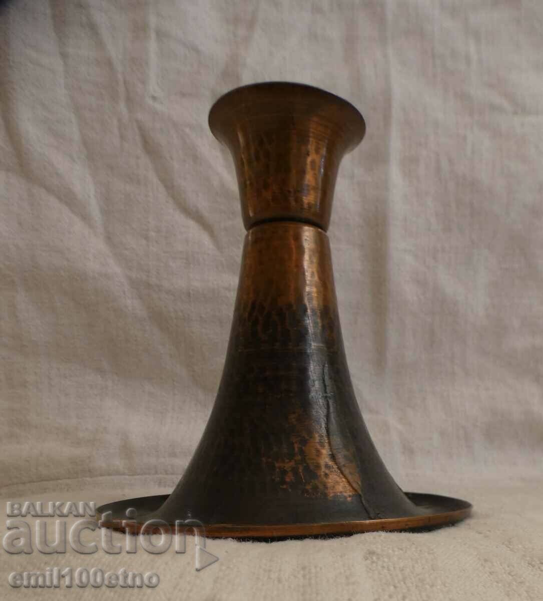 An old copper candleholder