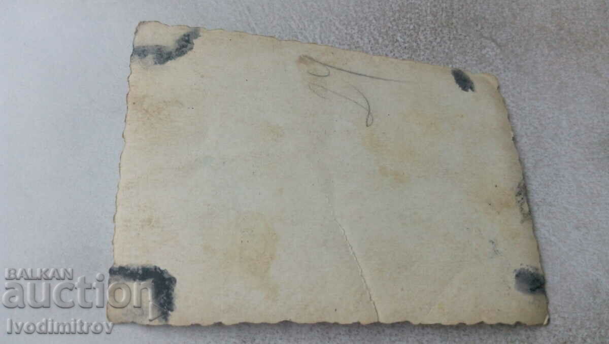 Photo Two officers, a man and a woman, under a bridge on a frozen river with price 2.35 BGN | € 1.20 Photo Two officers, a man and a woman, under a bridge on a frozen river with price 2.35 BGN | € 1.20