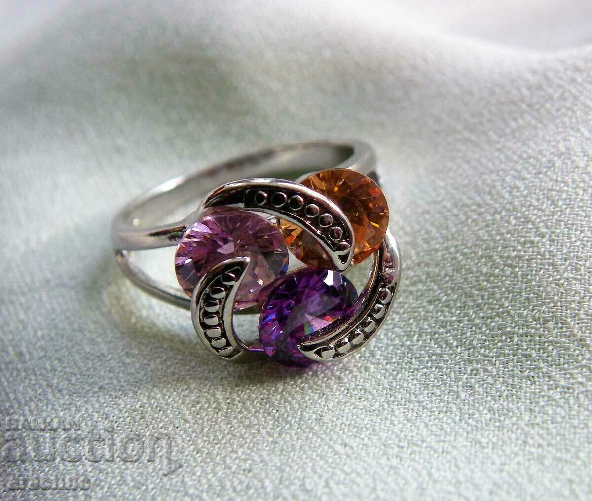 Silver ring with three colors of tourmalines