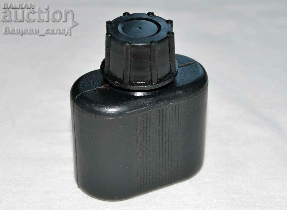 AK-47 oil can with gun oil AK-47 oil can with gun oil