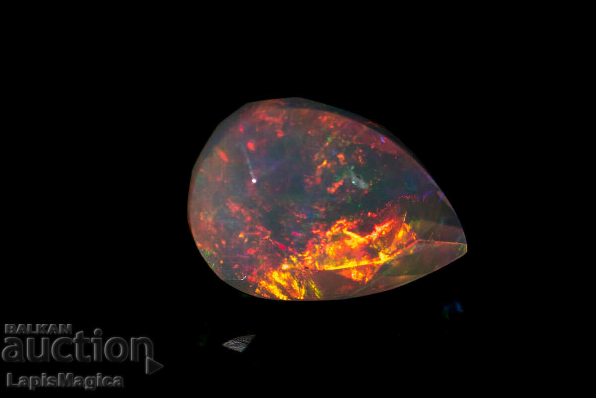 Delivery of Faceted Ethiopian Opal 0.61ct Teardrop Cut Delivery of Faceted Ethiopian Opal 0.61ct Teardrop Cut