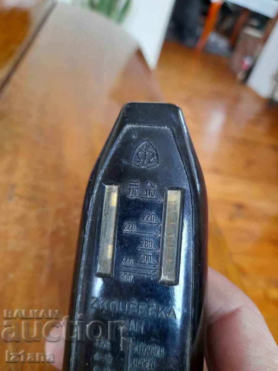 Auction An old voltage tester Auction An old voltage tester