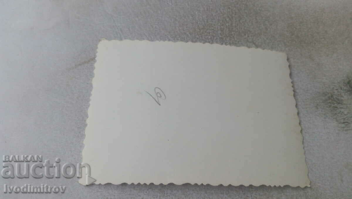 Photo Woman and three men playing cards on the beach with price 1.65 BGN | € 0.84 Photo Woman and three men playing cards on the beach with price 1.65 BGN | € 0.84