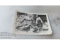Снимка Жена в народна носия с кобилица с два котела на чешма