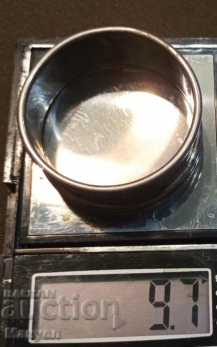 Auction  Silver ring, napkin holder.