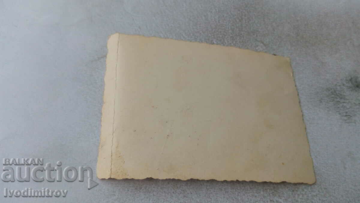 Photo Woman and three children in front of old houses with price 1.35 BGN | € 0.69 Photo Woman and three children in front of old houses with price 1.35 BGN | € 0.69