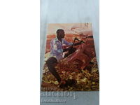 Postcard Ghana Carving an Ashanti Stool