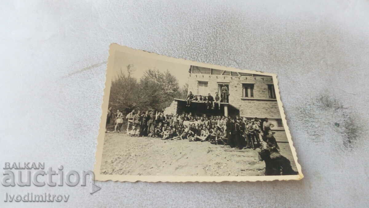 Photo Men, women and children next to the Siovtsi hut at the foot of Murgasha peak, 1943