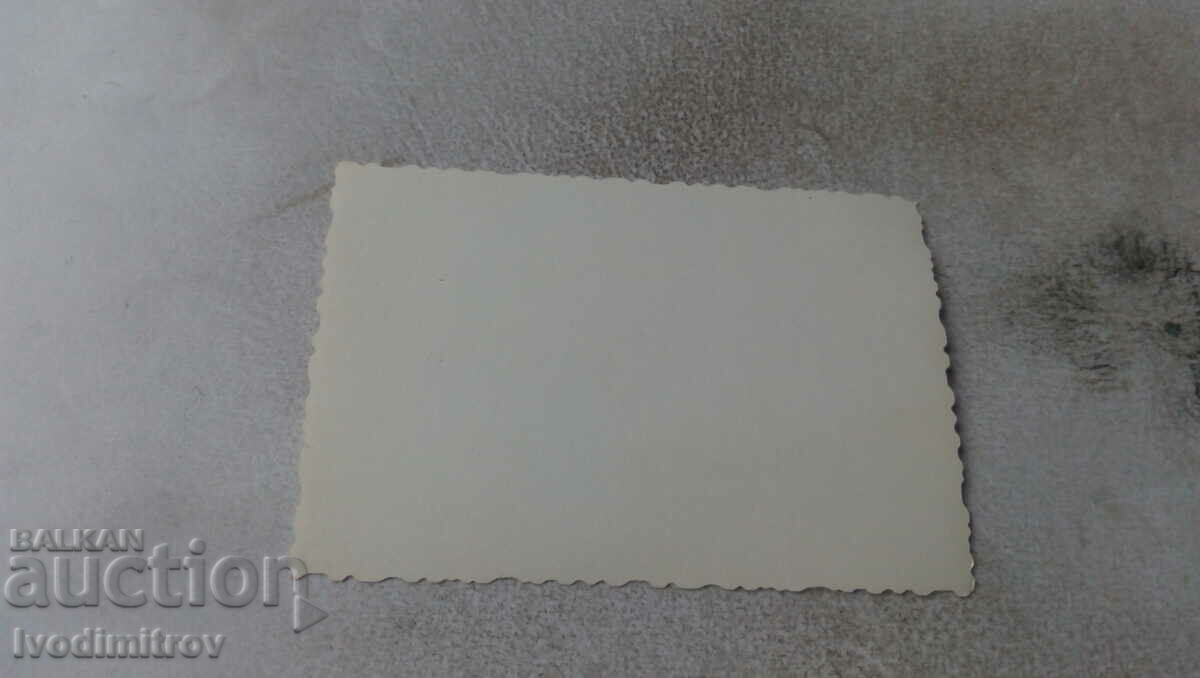 Photo Three young men and a woman on the beach with price 1.65 BGN | € 0.84 Photo Three young men and a woman on the beach with price 1.65 BGN | € 0.84