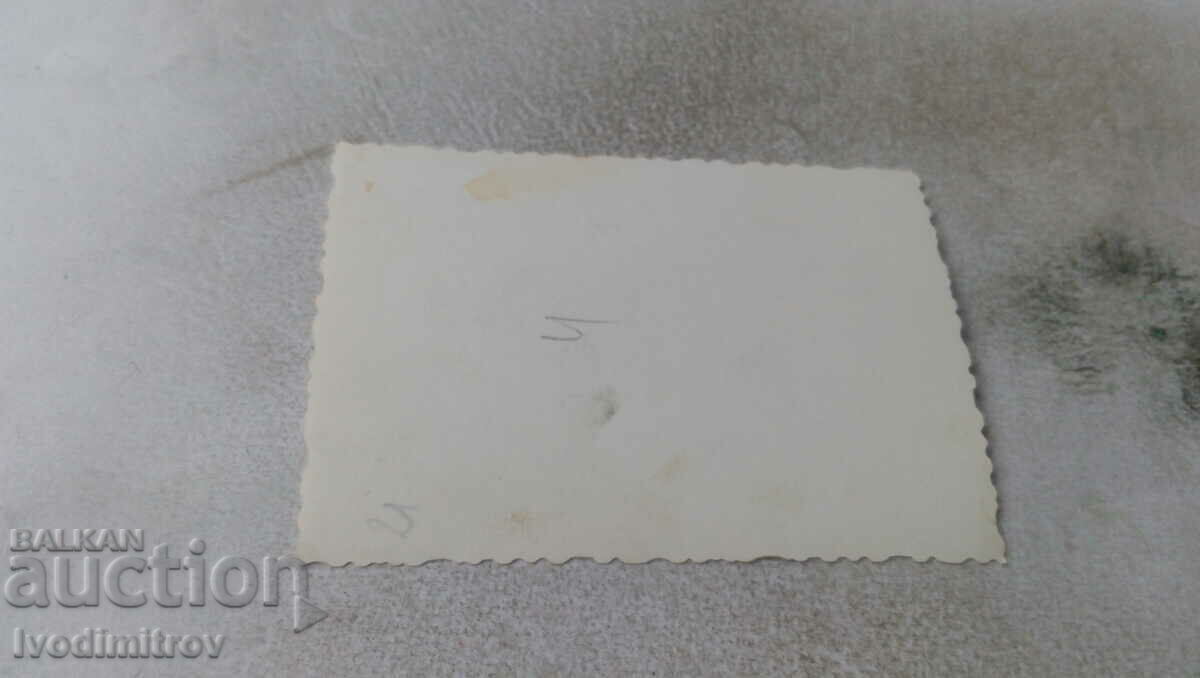 Photo Three young men and a woman on the beach with price 1.65 BGN | € 0.84 Photo Three young men and a woman on the beach with price 1.65 BGN | € 0.84