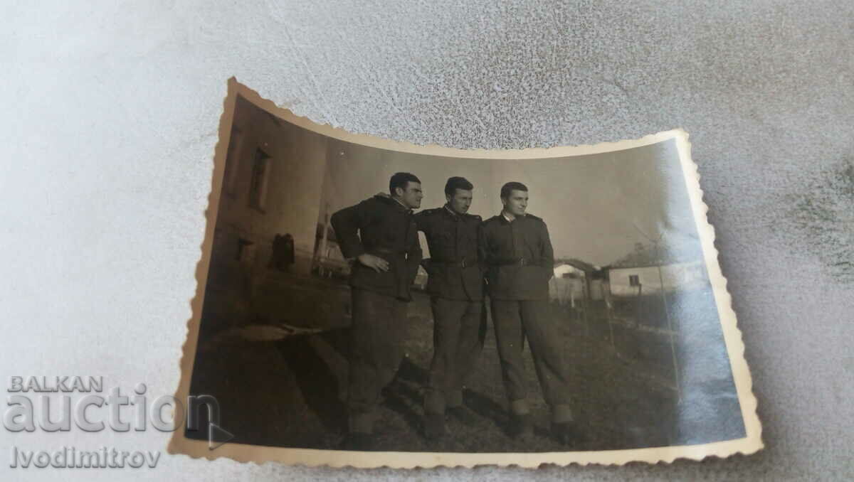 Photo Three soldiers in the barracks