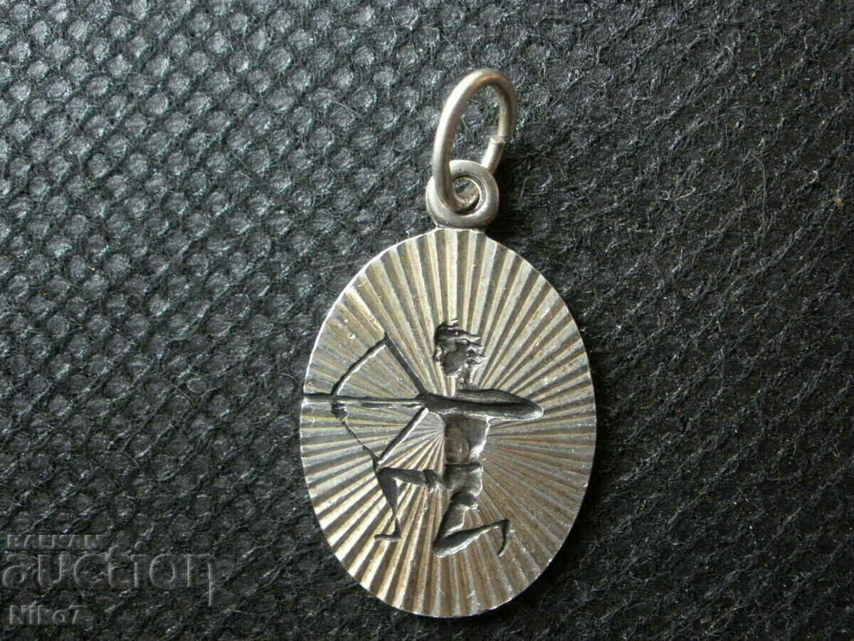 Old silver medallion in antique style - Sagittarius. Old silver medallion in antique style - Sagittarius.