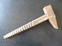 Old hammer, wooden handle