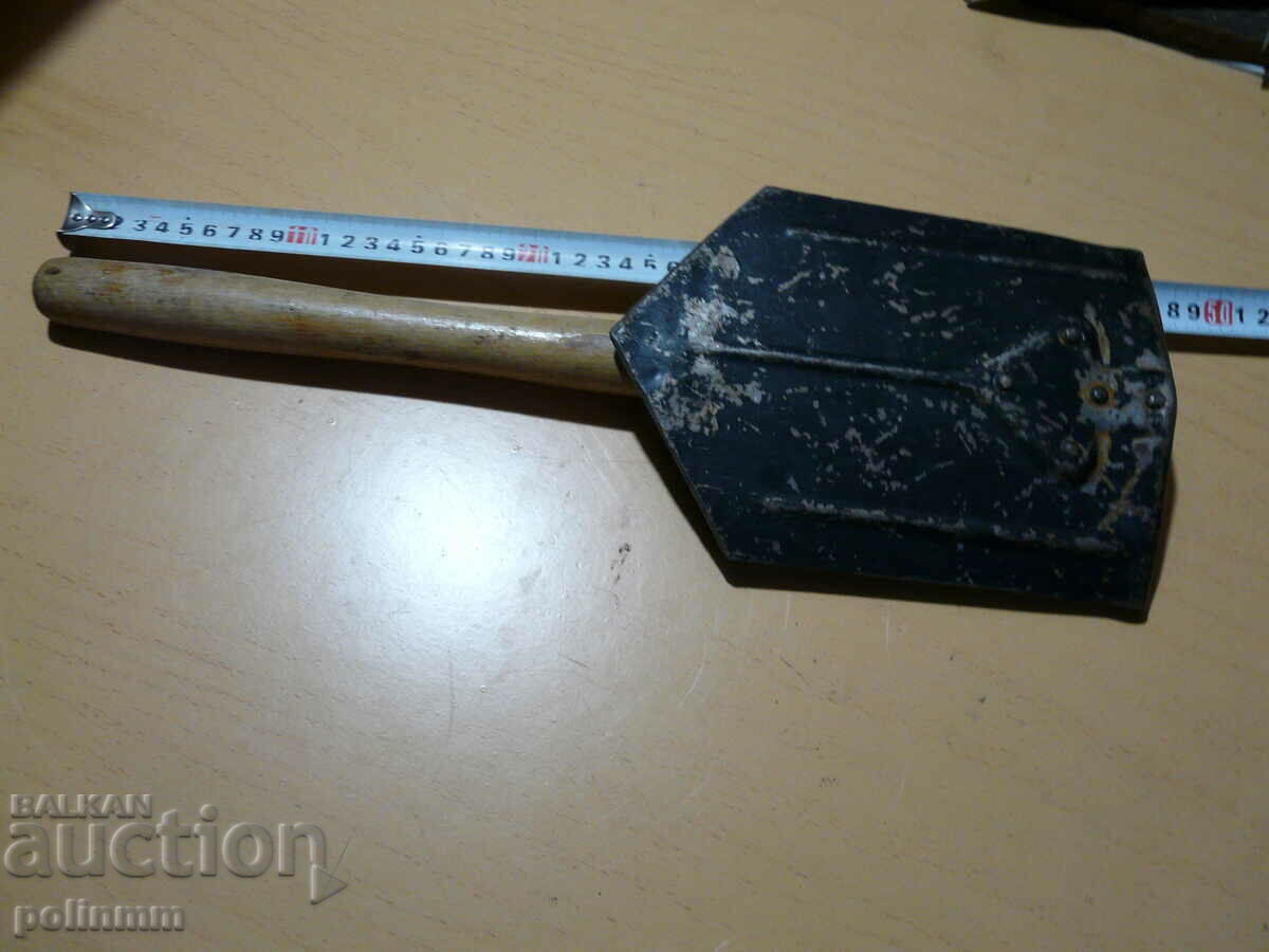 Παράδοση Παλιό πτυσσόμενο φτυάρι Παράδοση Παλιό πτυσσόμενο φτυάρι