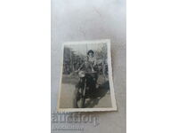 Photo Two girls on a vintage motorcycle