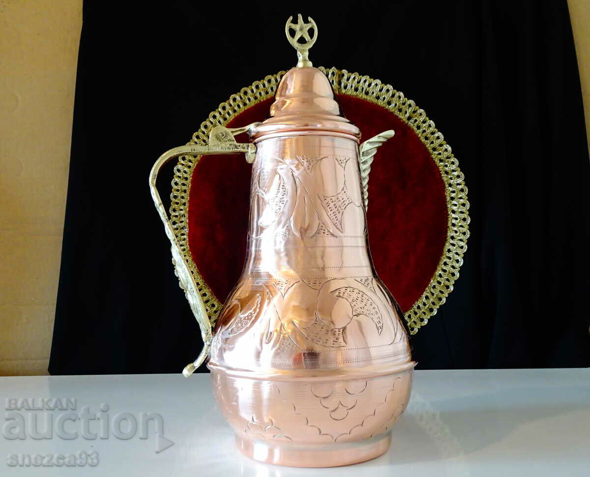 Ancient copper jug, relief, Islam.