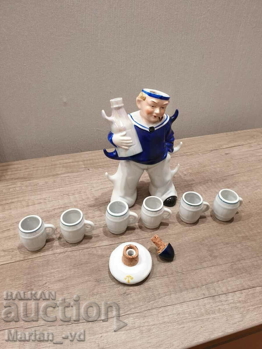 Old German porcelain liquor bottle with 6 cups with price 180.00 BGN | € 92.03 Old German porcelain liquor bottle with 6 cups with price 180.00 BGN | € 92.03