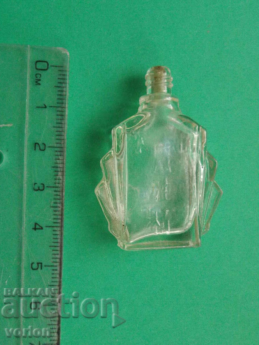 Small glass bottle.