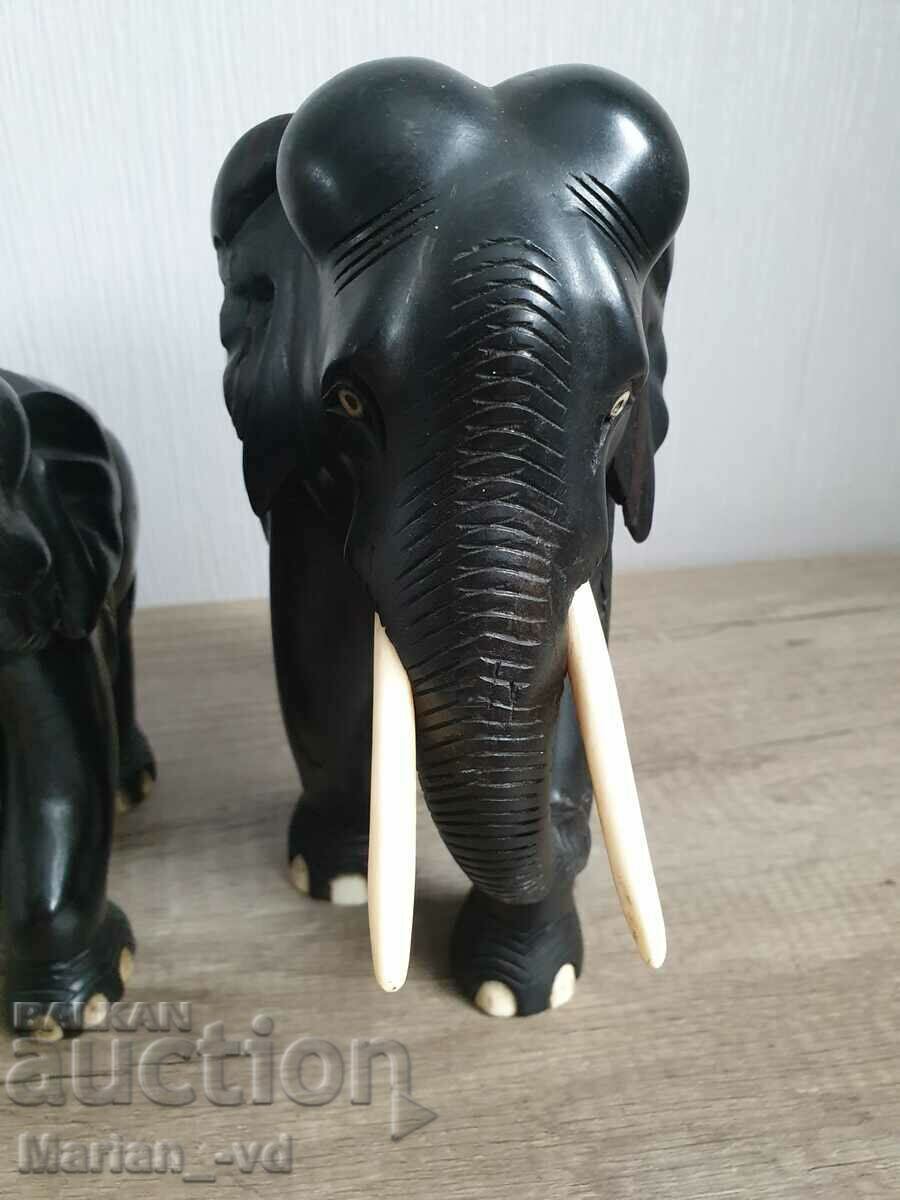 Two elephants of solid ebony wood and bone for tusks and claws with price 150.00 BGN | € 76.69 Two elephants of solid ebony wood and bone for tusks and claws with price 150.00 BGN | € 76.69