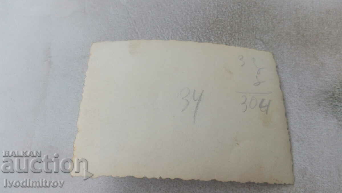 Photo Men drinking beer at a long table with price 1.65 BGN | € 0.84