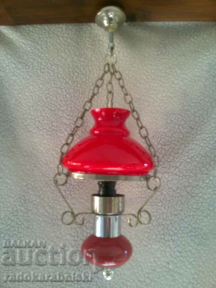 Beautiful chandelier with a red glass lampshade Beautiful chandelier with a red glass lampshade